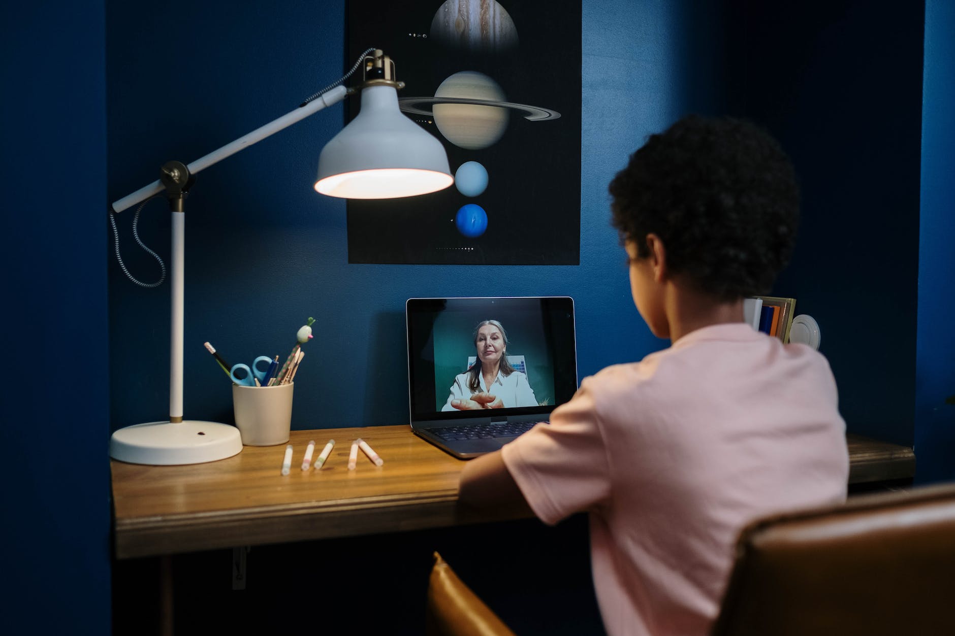 a student listening to online class